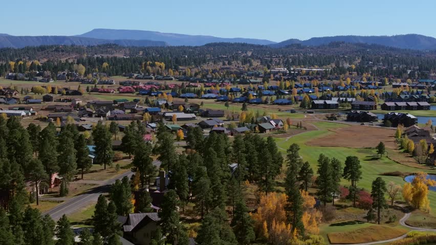 Scenic view of Pagosa Springs, Colorado showing residential homes, trees, and hills