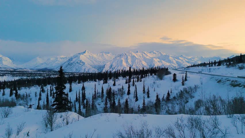 Amazing sunset view alongside the Alaskan Glacier Bay Area in Alaska | United States. An absolute winter wonderland.