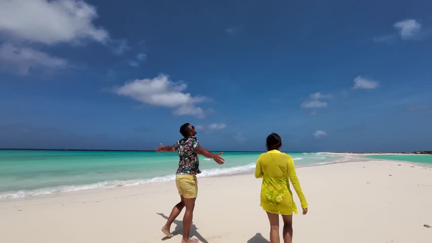 Rear View Of Romantic Couple On Caribean Beach Vacation, Los Roques Venezuela