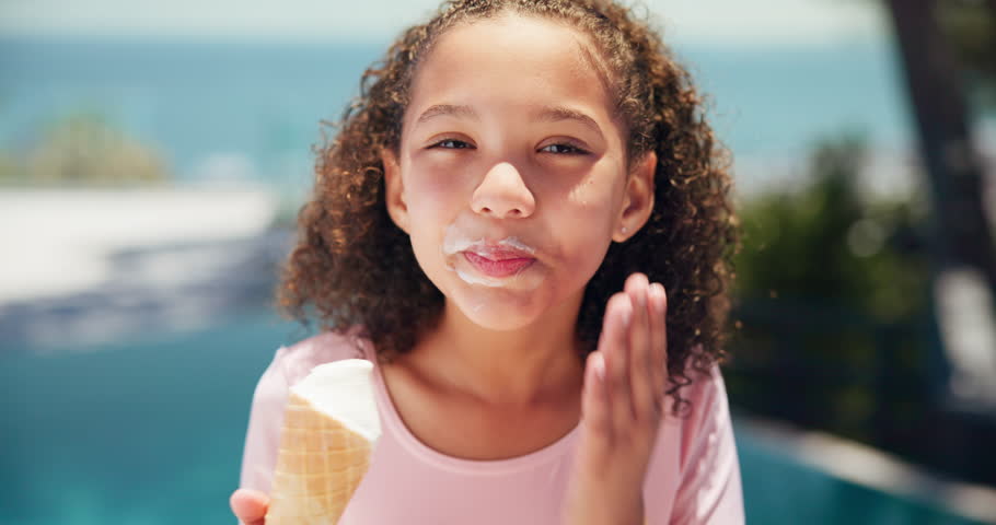 Face, child and outdoor for messy ice cream, travel and flavor development with vanilla gelato. Happy girl, portrait and person eating cool snack on school vacation, freedom and frozen sweet dessert