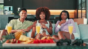 Laughing, conversation and people on sofa with snacks for gathering, reunion or chill on weekend. Mimosas, fruit and group of friends talking, relaxing and having fun together in living room in home. - Powered by Shutterstock - Get 15% off with code: PIKWIZARD15