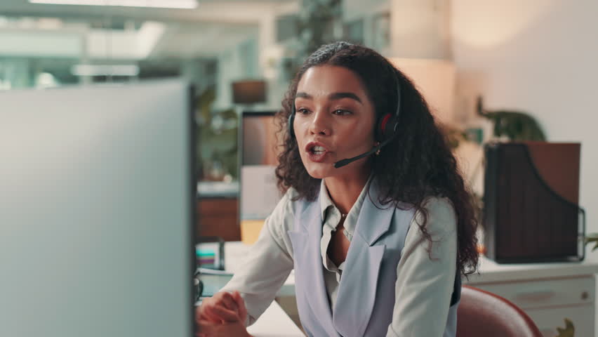 Woman, video call and laughing with headset by computer for virtual meeting, online consultation or funny client query. Night, friendly financial advisor and customer service for portfolio management