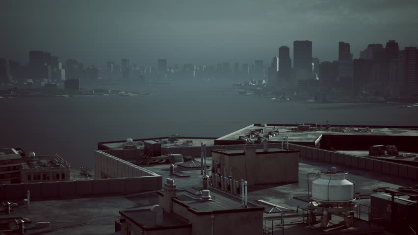 A serene view of a city skyline shrouded in mist during twilight hours, with rooftops and water reflecting the muted light of the evening.