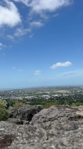 Panoramic view of the city from the top of a mountain.
