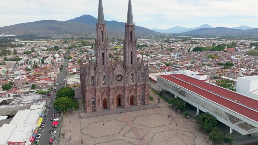 A drone shot of the Catholic Cathedral of Diocesan Sanctuary of Our Lady of Guadalupe in daytime in Zamora, Michoacan, Mexico