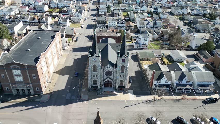 A drone view over the Divine Redeemer Church and other buildings in Mount Carmel, Pennsylvania