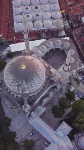 An aerial view of Nuruosmaniye Mosque and the Grand Bazaar at sunset in Istanbul, Turkey
