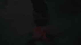 Volcan de Fuego with ash cloud and glowing lava at night in thunderstorm, aerial drone view - Powered by Shutterstock - Get 15% off with code: PIKWIZARD15