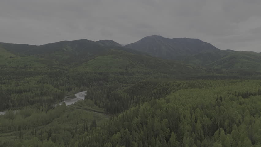 Endless Yukon beauty with flowing rivers and green forests.