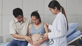 Obstetricians talk with pregnant patients provide close consultation and advice throughout the pregnancy assess the health fetus and check on the mother's health with the father encouraging.
 - Powered by Shutterstock - Get 15% off with code: PIKWIZARD15