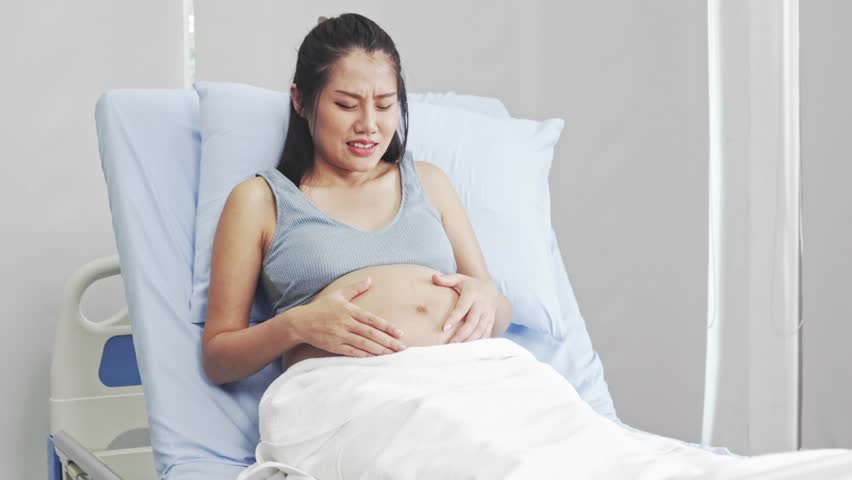 Pregnant women experience labor pains uterine contractions because the baby moves closer to the cervix. The pain does not go away the cervix begins open and amniotic fluid leaks.