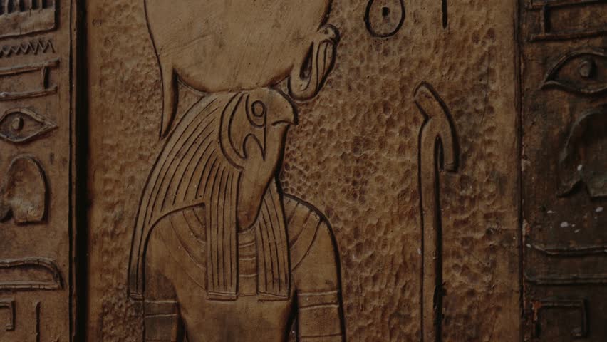 Ancient Egyptian carving of Horus, the falcon-headed god, with hieroglyphs. This detailed artwork reflects rich history, mythology, and craftsmanship. Explore the wonders of ancient Egypt