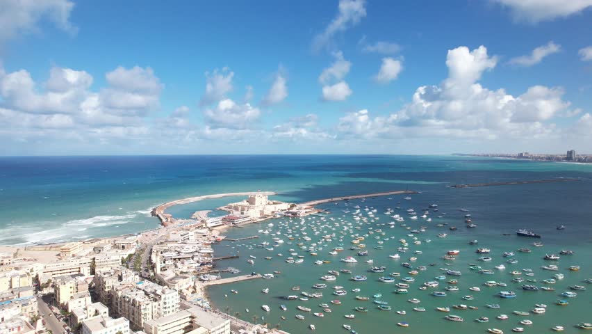Aerial drone footage of the Mediterranean Corniche in Alexandria, Egypt.
