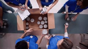 Food Bank Volunteer Community Packing Donation. Non Profit Aid And Support - Powered by Shutterstock - Get 15% off with code: PIKWIZARD15