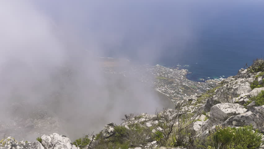 A view of the foggy top of Table Mountain, Cape Town, overlooking the coast