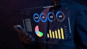 Businessman working with smartphone, showing chart and graph icons on virtual hologram digital screen interface. Big data analytics, BI business intelligence, investment and financial concept. - Powered by Shutterstock - Get 15% off with code: PIKWIZARD15