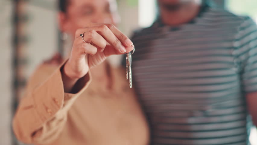 New home, happy and hands of couple with keys for property, moving day and house investment. Homeowner, real estate and man and woman with keychain for mortgage, purchase and rental apartment