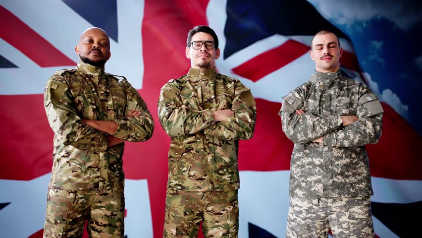 Patriotic Military Soldiers In Front Of British Flag