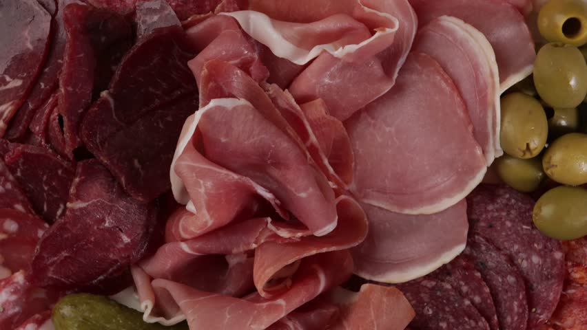 overhead view of cured meat snack platter rotation food