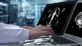Close up of doctor working on tablet and laptop with human brain anatomy display on screen. Smart medical worker checking hand and diagnosis brain injury while preparing for brain surgery. Remedial. - Powered by Shutterstock - Get 15% off with code: PIKWIZARD15