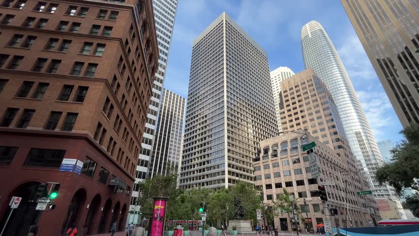 Skyscrapers In San Francisco Driving Through The City Looking At Tall Buildings