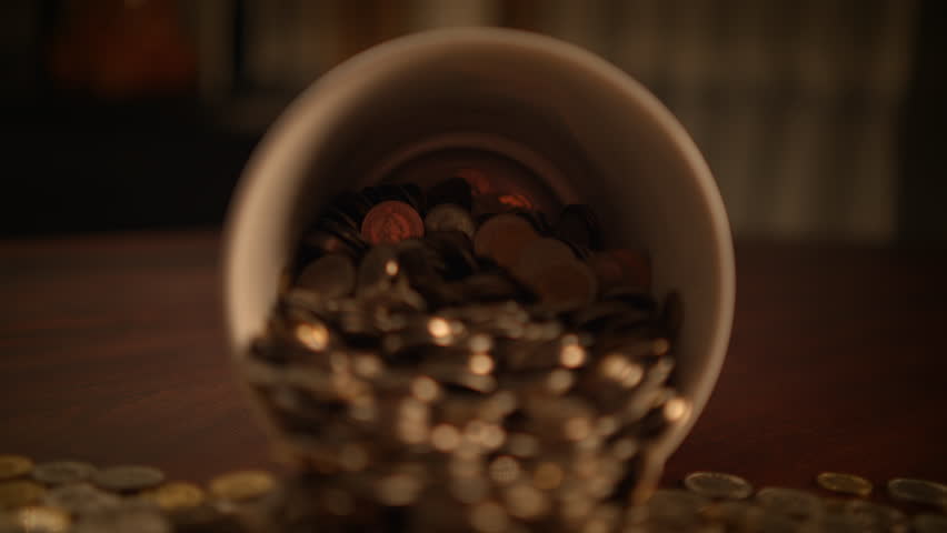 A Rich and Abundant Collection of Various Coins Found Gathered Together in a Cup