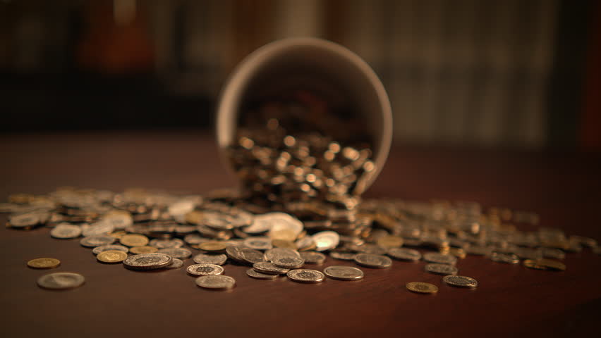 A Rich and Abundant Collection of Various Coins Found Gathered Together in a Cup