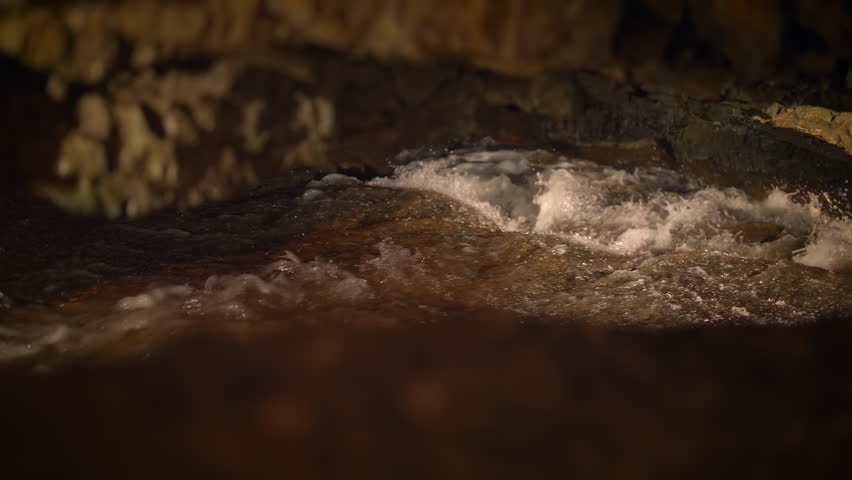 Exploring the Dynamic Water Flow in a Mysterious Cave Setting for Unique Experiences