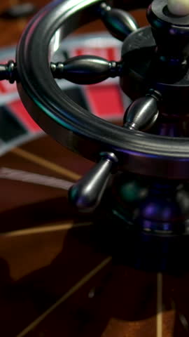 A close-up view of an antique roulette wheel spinning, revealing the thrill of gambling in a bygone era