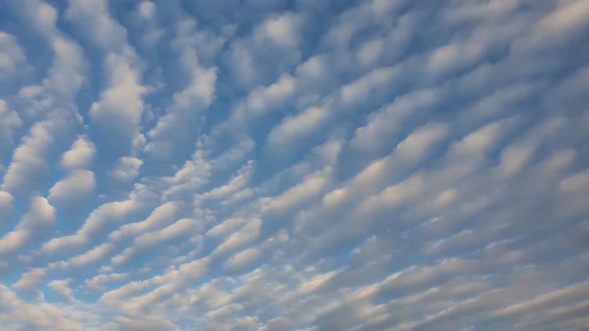 Abstract cloudscape scene. Beautiful sky background with fluffy clouds texture. Marvelous aerial composition, overcast shapes and patterns. Air freshness and celestial beauty