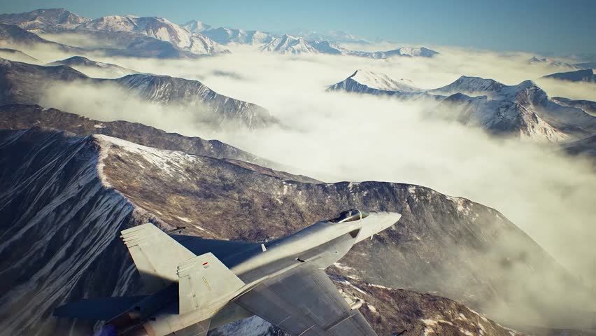 Fighter jet testing over snow-covered mountain ranges