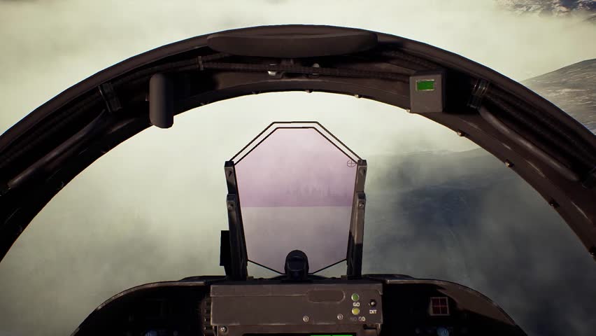 Cockpit POV of Fighter jet attempting low-altitude flight over snowy mountains with precision maneuvering