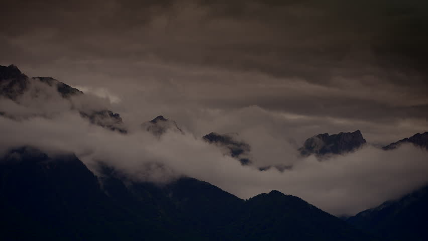 Time Lapse of Cumulus Clouds moving over mountain landscape scenery