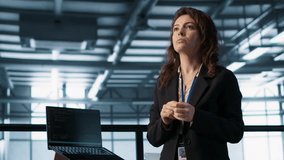 Technicians in high tech AI data center workspace looking at hologram visualization. Programmer working on securing server room hardware using AR artificial intelligence tech, camera A - Powered by Shutterstock - Get 15% off with code: PIKWIZARD15