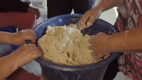 Mastering traditional tamales through mixing masa and preparing fillings in a community kitchen - Powered by Shutterstock - Get 15% off with code: PIKWIZARD15