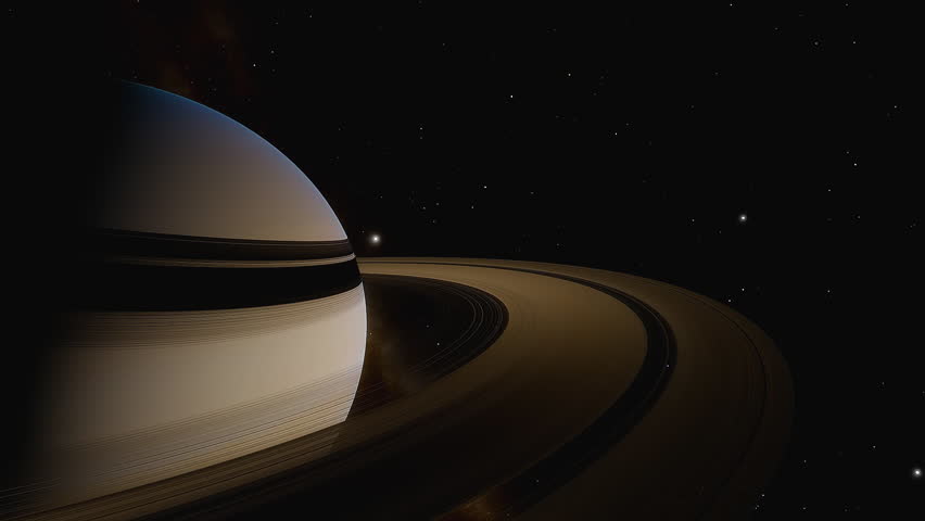 The Sun going through the rings of the planet Saturn. View from the dark side of the planet. Some of its moons orbiting around.