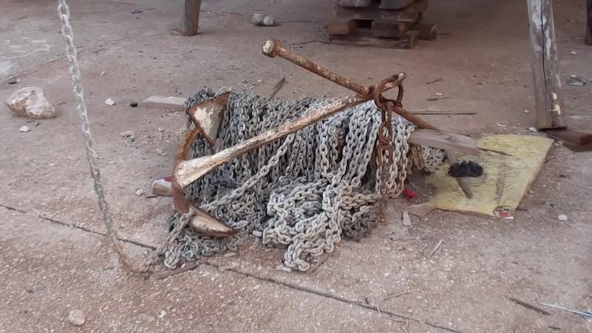 Viewing of chain and anchor at the ground and then propeller and rudder at dry-dock, tilt