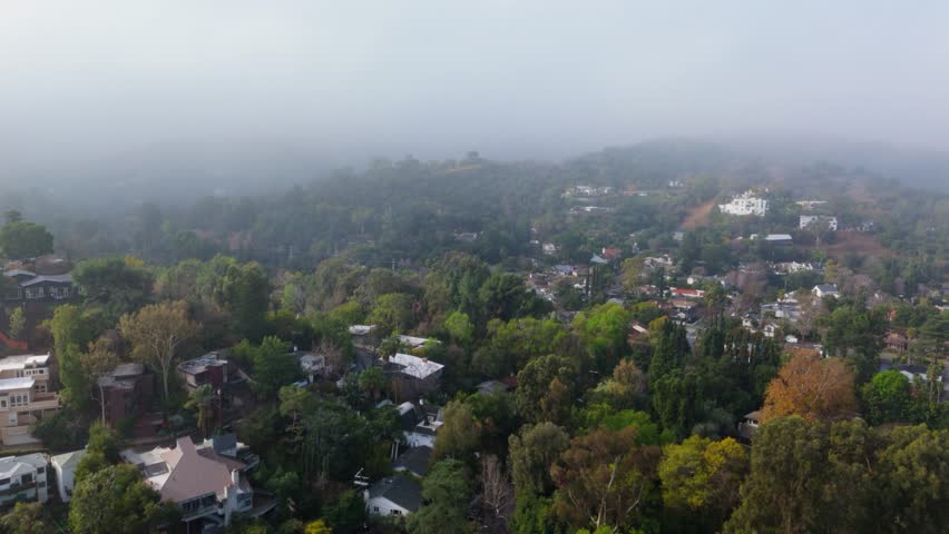 Aerial View of a Foggy Hillside Neighborhood in Los Angeles