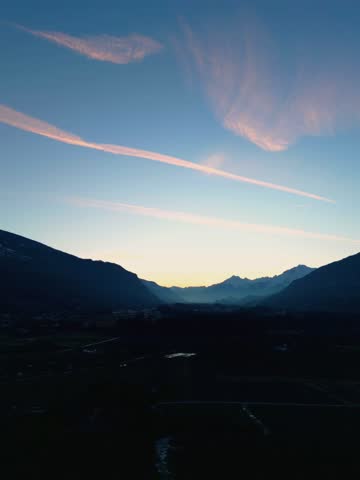 Sunset over the swiss mountains, Sierre Switzerland, Crans-Montana, Cotton candy clouds