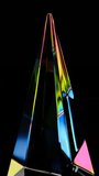 crystal prism with refraction and holographic effect rotating on dark background - Powered by Shutterstock - Get 15% off with code: PIKWIZARD15