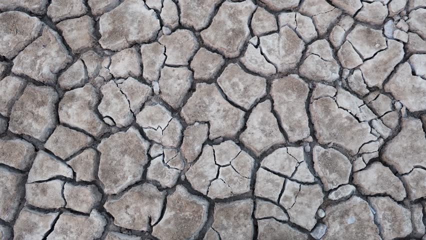 dry cracked farm fields close up view from top angle