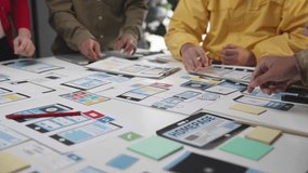 Collaborative UX Design Session with Focus on Smartphone Interface Prototypes and User Feedback. SACTR - Powered by Shutterstock - Get 15% off with code: PIKWIZARD15