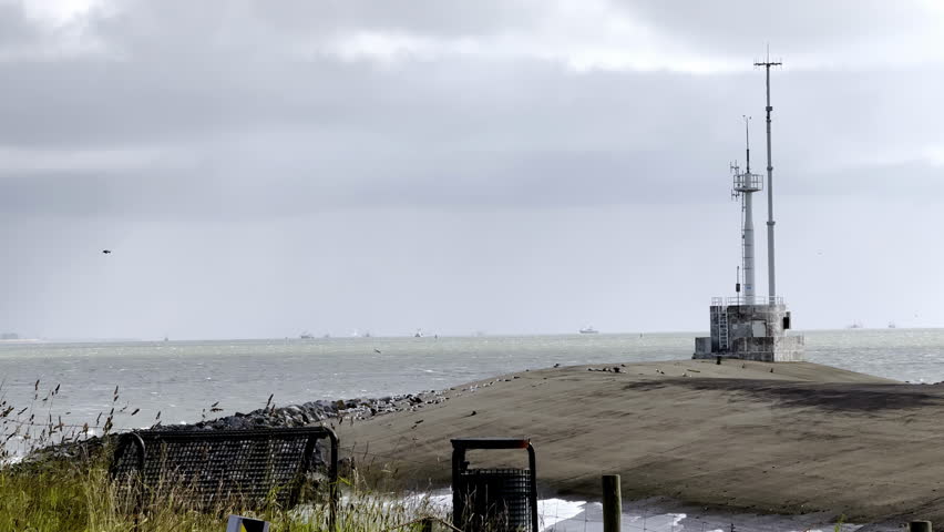 Birds Flying Over The Sea In Daytime From North Sea-Baltic Sea Canal. - wide shot
