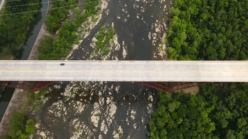 An empty bridge over the Shenandoah River. The view from the bottom from top to bottom.
