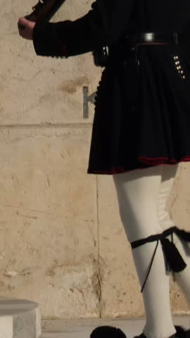 Athens, Greece Evzones 04.02.2025 Greek Presidential Guard in national clothes uniform at the tomb of unknown soldier in Athens, Greece. Ceremonial ritual changing guards, aerial shot