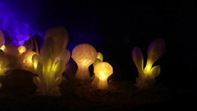 Abstract Miniature of Another Planet with Giant Glowing Mushrooms. A Nighttime Scene on an Alien World, Illuminated by the Soft Glow of Otherworldly Fungi. Selective focus - Powered by Shutterstock - Get 15% off with code: PIKWIZARD15