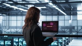 Cybersecurity expert in data center frantically trying to counter a hacker attack. Server room worker under pressure to secure sensitive information after threat alert received on laptop, camera B - Powered by Shutterstock - Get 15% off with code: PIKWIZARD15