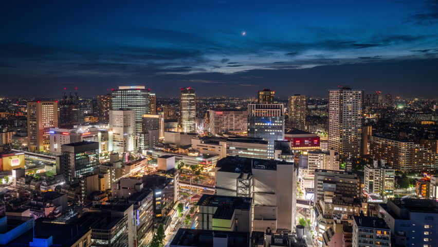 Kawasaki, Japan downtown city skyline from dusk till night.