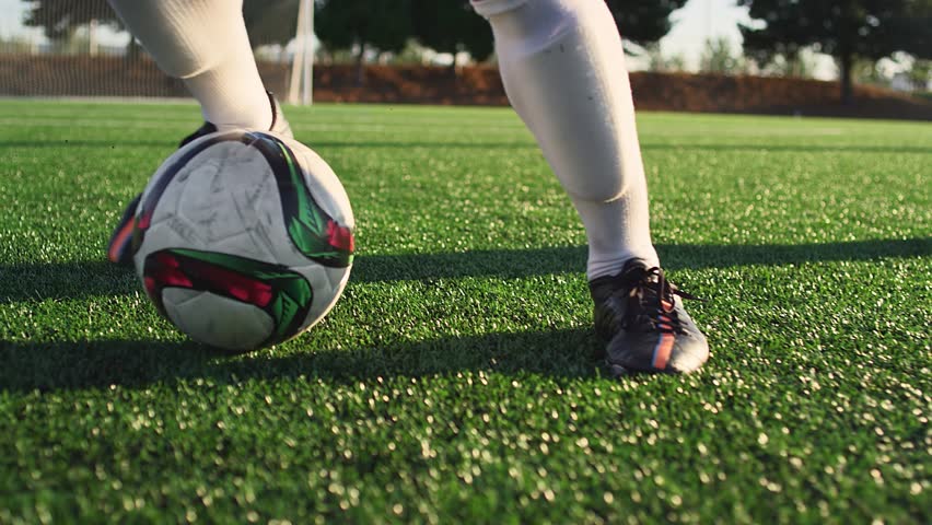 Professional player playing the soccer in the stadium - Powered by Shutterstock - Get 15% off with code: PIKWIZARD15