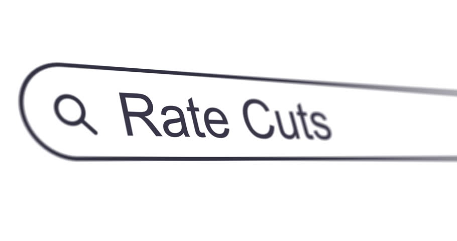 Typing words Rate cuts into search box, search bar close-up, looking for loan rates reduction, footage